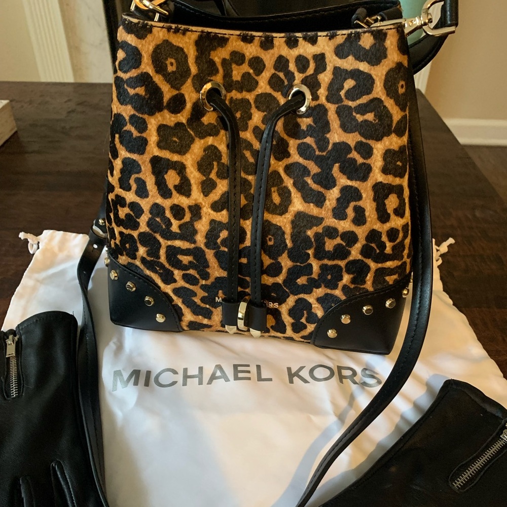 Michael Kors small Leopard calf hair bag with detachable strap.